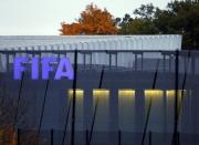 The FIFA logo is seen in the early morning at their headquarters in Zurich October 8, 2015. REUTERS/Arnd Wiegmann