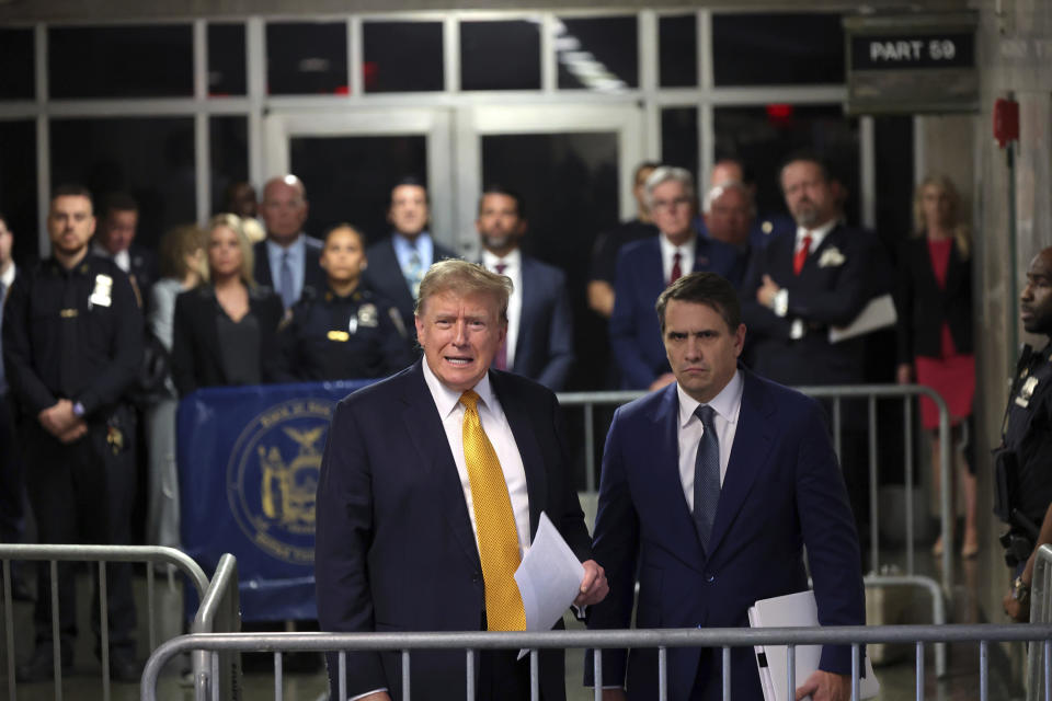 Former President Donald Trump speaks alongside his attorney Todd Blanche following the day's proceedings in his trial Tuesday, May 21, 2024, in Manhattan Criminal Court in New York. (Michael M. Santiago/Pool Photo via AP)