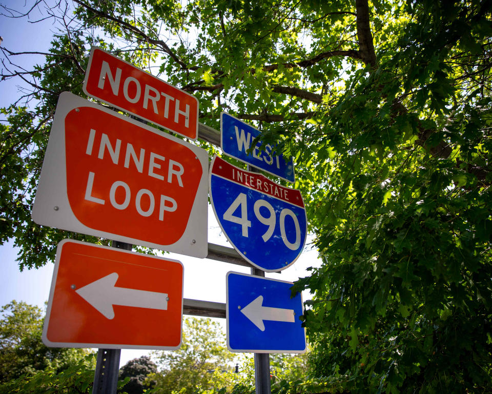 A sign on East Main Street shows the direction of the Inner Loop Highway in Rochester, N.Y. on Aug. 6, 2023. 