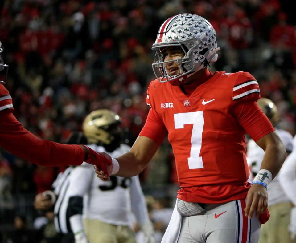 Ohio State Buckeyes quarterback C.J. Stroud (7) celebrates after scoring a touchdown in the second quarter of Saturday's NCAA Division I football game against the Purdue Boilermakers at Ohio Stadium in Columbus, Oh., on November 13, 2021.