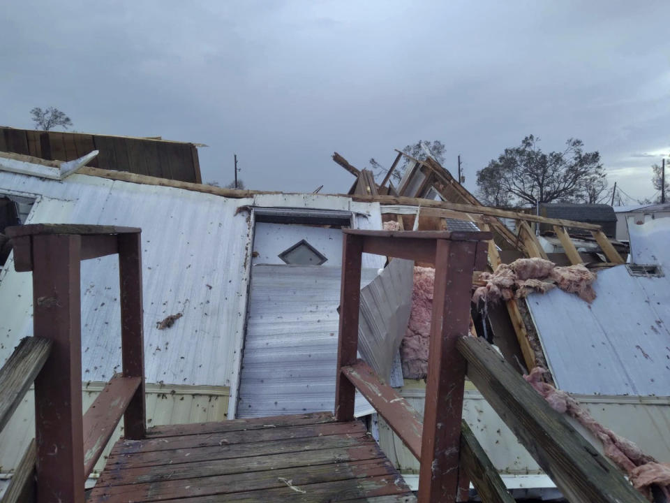 This photo provided by Katlyn Smith shows damage to the Jesse James trailer park on country club Road in Lake Charles, La., from Hurricane Laura on Friday, Aug. 28, 2020. The destructive storm surge has receded, and the cleanup has begun from Hurricane Laura. But officials along this shattered stretch of southwestern Louisiana are warning returning residents they will face weeks without power or water amid the hot, stifling days of late summer. (Katlyn Smith via AP)