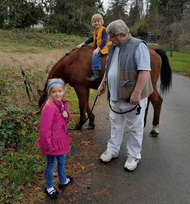 Anne and Barry, age 6, with their dad, Barry Senior, and their horse, Tucker