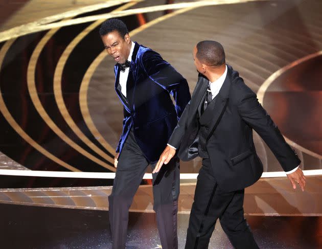 Chris Rock and Will Smith onstage during the show at the 94th Academy Awards. (Photo: Myung Chun via Getty Images)