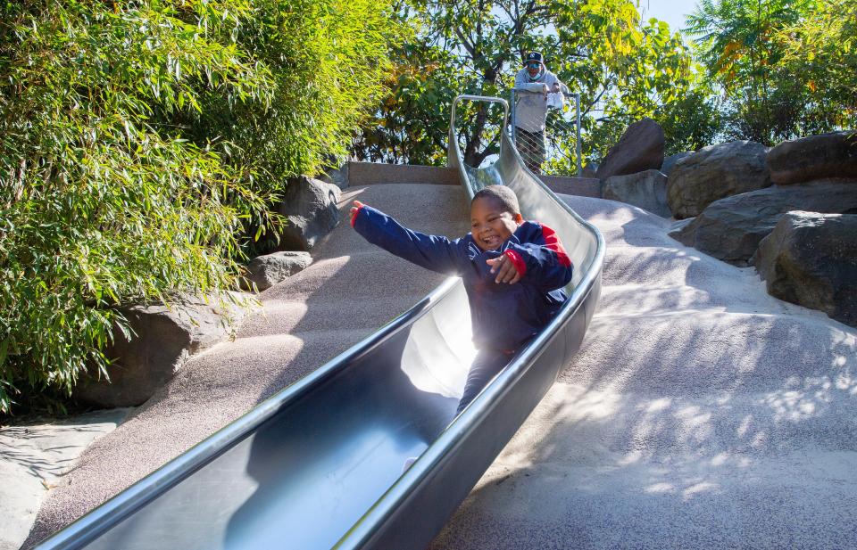 Selina Martinez’s son Blake, 5, plays at a park near her Brooklyn home while his father, David Martinez, looks on.