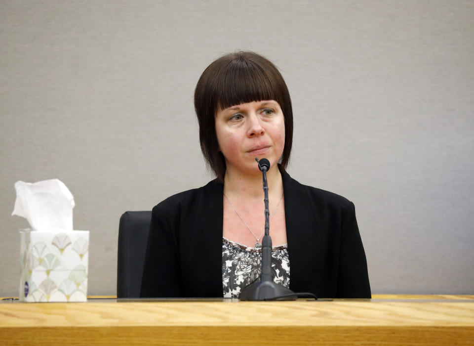 Alana Guyger, Amber Guyger's sister, testifies during the punishment phase of the trial of former Dallas police officer Amber Guyger, Wednesday, Oct. 2, 2019 in Dallas. Guyger, who said she fatally shot her unarmed black neighbor Botham Jean after mistaking his apartment for her own, was found guilty of murder the day before. (Tom Fox/The Dallas Morning News via AP, Pool)