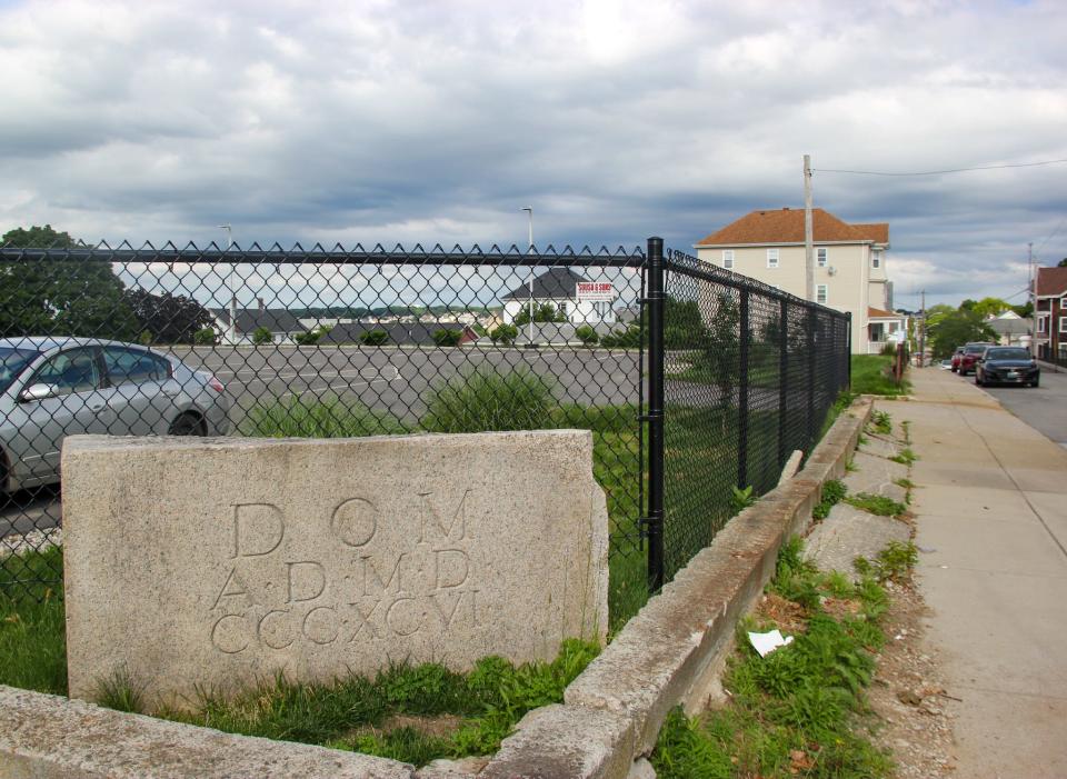 A stone marked with the year 1896 sits at the corner of Dover and Snell streets in Fall River, where once stood Sts. Peter and Paul Church.