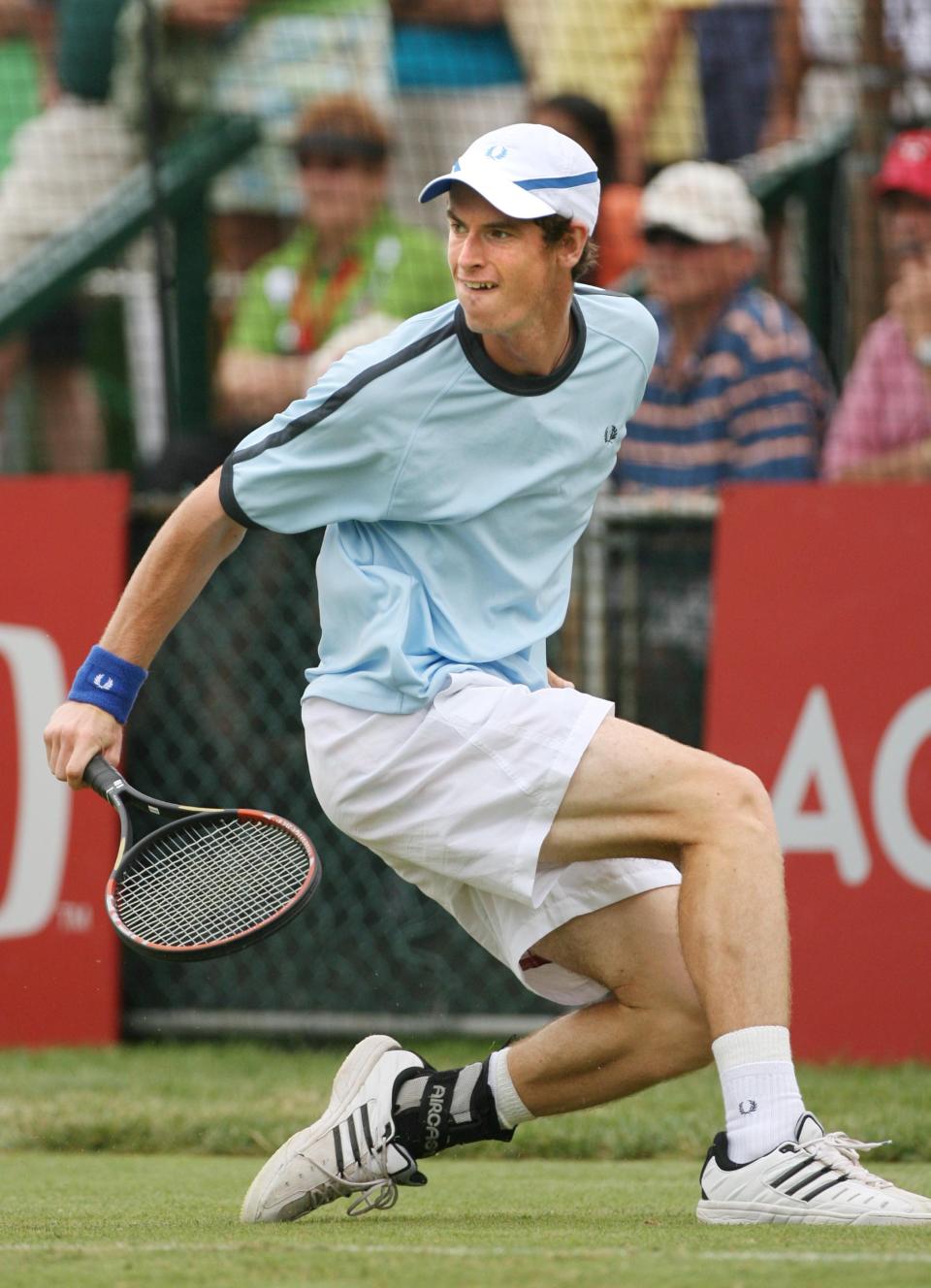 Andy Murray returns a shot during his match against Ricardo Mello in 2006.