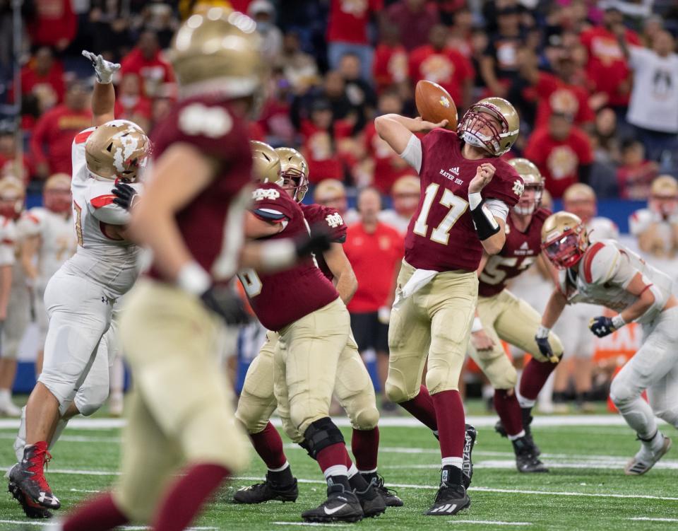 Mater Dei's Mason Wunderlich (17) attempts a pass during the IHSAA Class 2A football state championship between the Mater Dei Wildcats and the Andrean Fighting 59ers at Lucas Oil Stadium in Indianapolis, Ind., Saturday afternoon, Nov. 27, 2021.