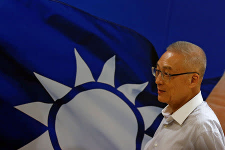 FILE PHOTO - Wu Den-yih, newly elected chairman of Taiwan's opposition Nationalist Kuomintang Party (KMT), arrives at a news conference in Taipei, Taiwan May 20, 2017. REUTERS/Tyrone Siu