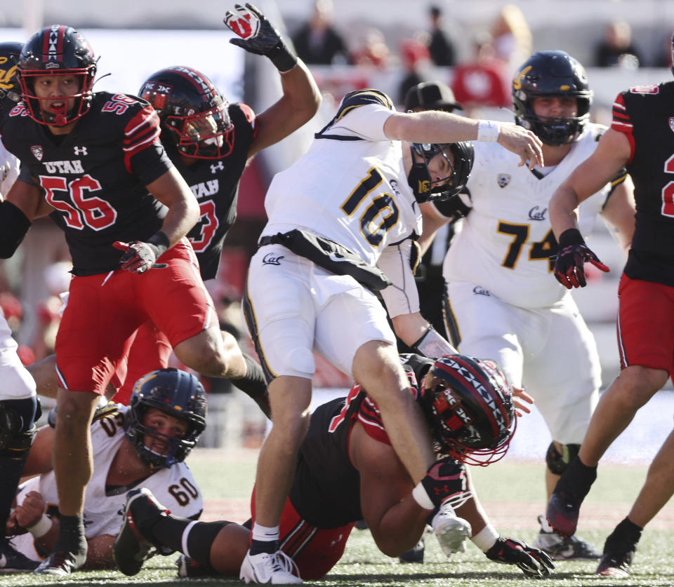 Utah defensive tackle Junior Tafuna (58) hurries California quarterback Ben Finley (10) and is called for roughing the passer during an NCAA college football game in Salt Lake City, Saturday, Oct. 14, 2023. (Jeffrey D. Allred/The Deseret News via AP)