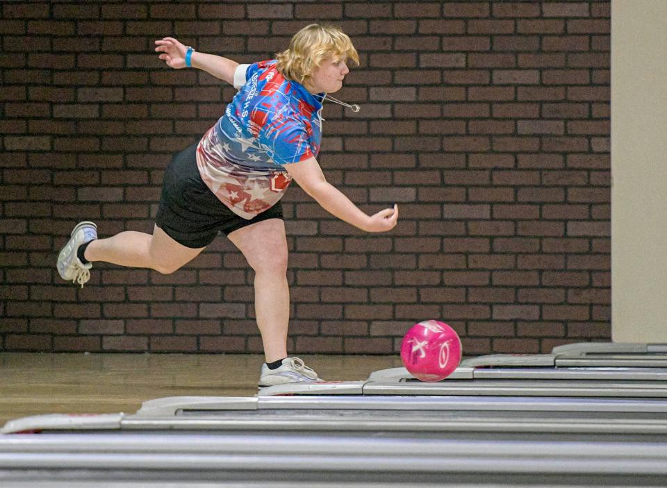 Madison Keunning rolls for Seabreeze High School during the state bowling championships at Boardwalk Bowl Entertainment Center in Orlando on Thursday, Nov. 2, 2023.