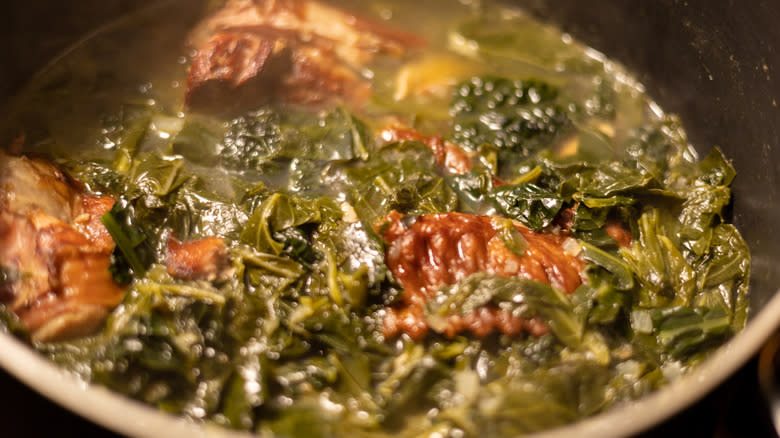 Close-up of collard greens with cooked turkey