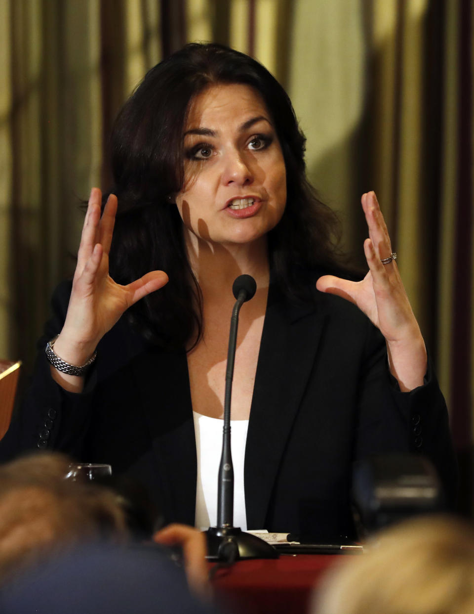 British lawmaker Heidi Allen, speaks at a press conference in Westminster in London, Wednesday, Feb. 20, 2019. Cracks in Britain's political party system yawned wider Wednesday, as three pro-European lawmakers - Soubry, Allen and Wollaston - quit the governing Conservatives to join a newly formed centrist group of independents who are opposed to the government's plan for Britain's departure from the European Union. (AP Photo/Alastair Grant)