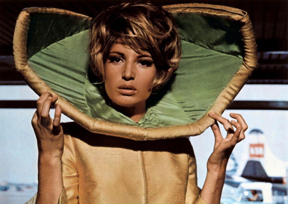 Monica Vitti in a ‘camp’ Modesty Blaise (1966), with Dirk Bogarde and Terence Stamp - alamy