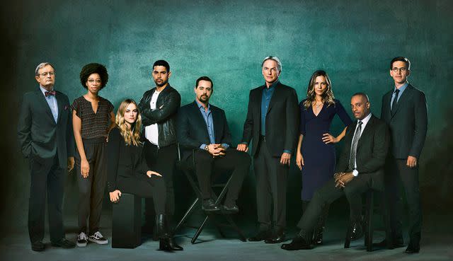 Kevin Lynch/CBS (L-R) David McCallum, Diona Reasonover, Emily Wickersham, Wilmer Valderrama, Sean Murray, Mark Harmon, Maria Bello, Rocky Carroll and Brian Dietzen