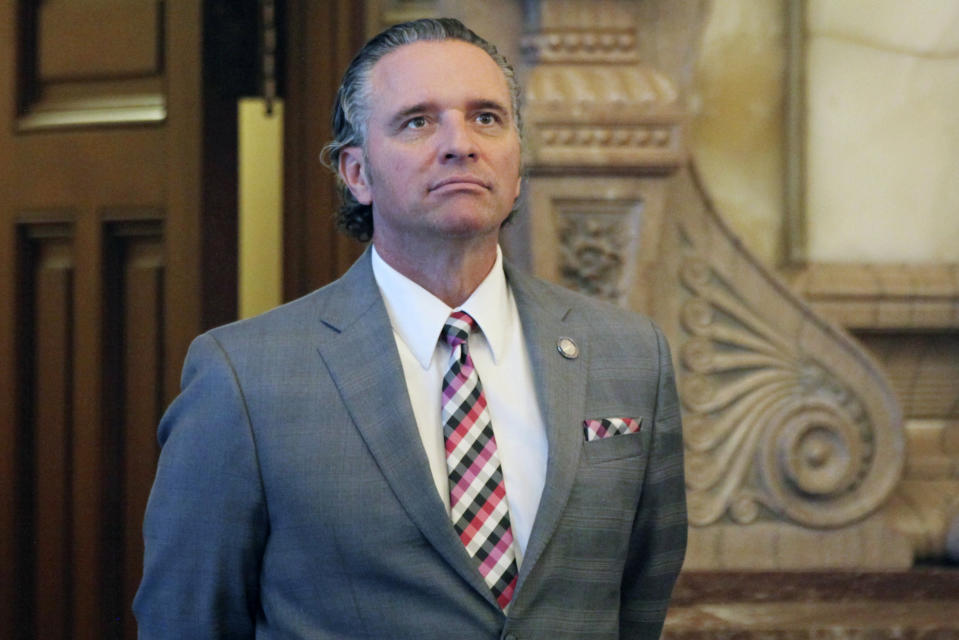 Kansas Senate President Ty Masterson, R-Andover, follows a session of his chamber, Thursday, Jan. 26, 2023, at the Statehouse in Topeka, Kansas. At least seven Kansas Republican Party officials last year received subpoenas from the state Governmental Ethics Commission demanding that they turn over all of their email, text and social media communications with Masterson for the last seven months of 2020 as part of an investigation of GOP campaign activities that year. (AP Photo/John Hanna)