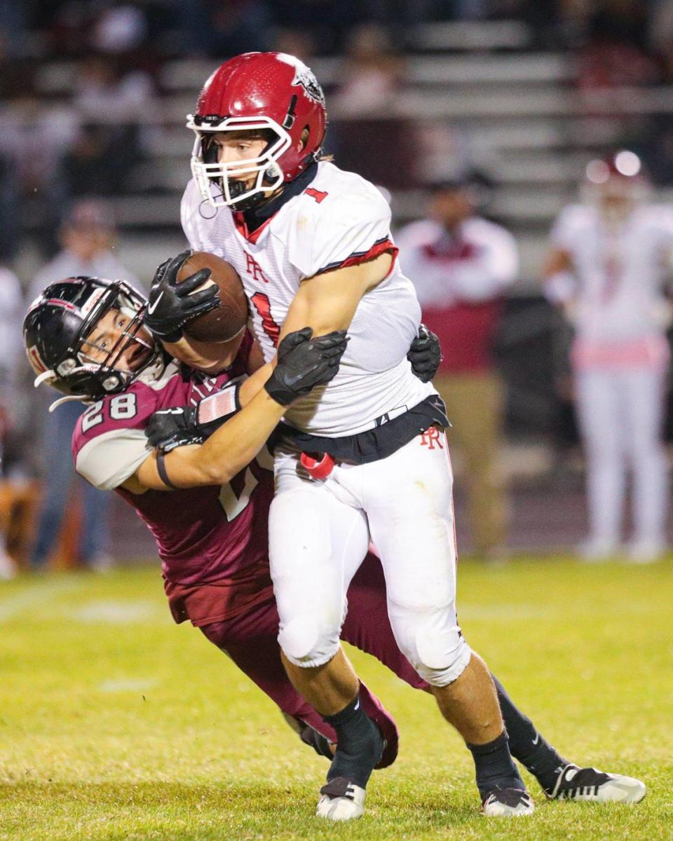 Jose Bernal tackles Conner Bowman. Nipomo won 34-21 over Paso Robles High School Oct. 20, 2023 with one more game left in the football schedule before the playoffs.