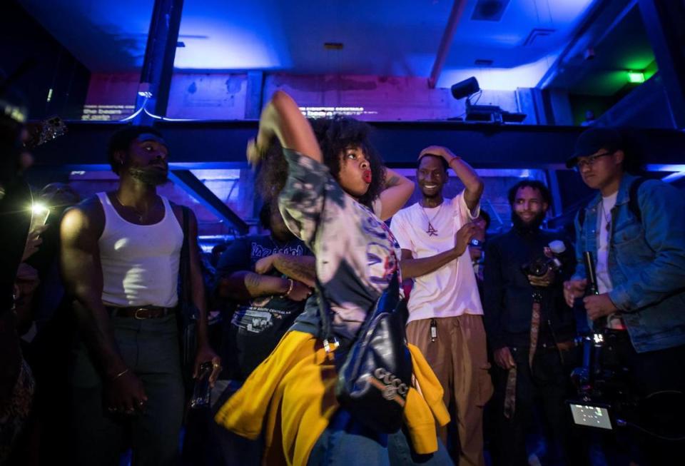 The dance floor makes space for Tasia Turner, of Sacramento, as they dance before a showcase performance with Yumz, right, and crew at Night Walkers “Intrusion” on June 8 at Tiger Restaurant & Lounge in downtown Sacramento. The dance battles and showcases are being held every Thursday.