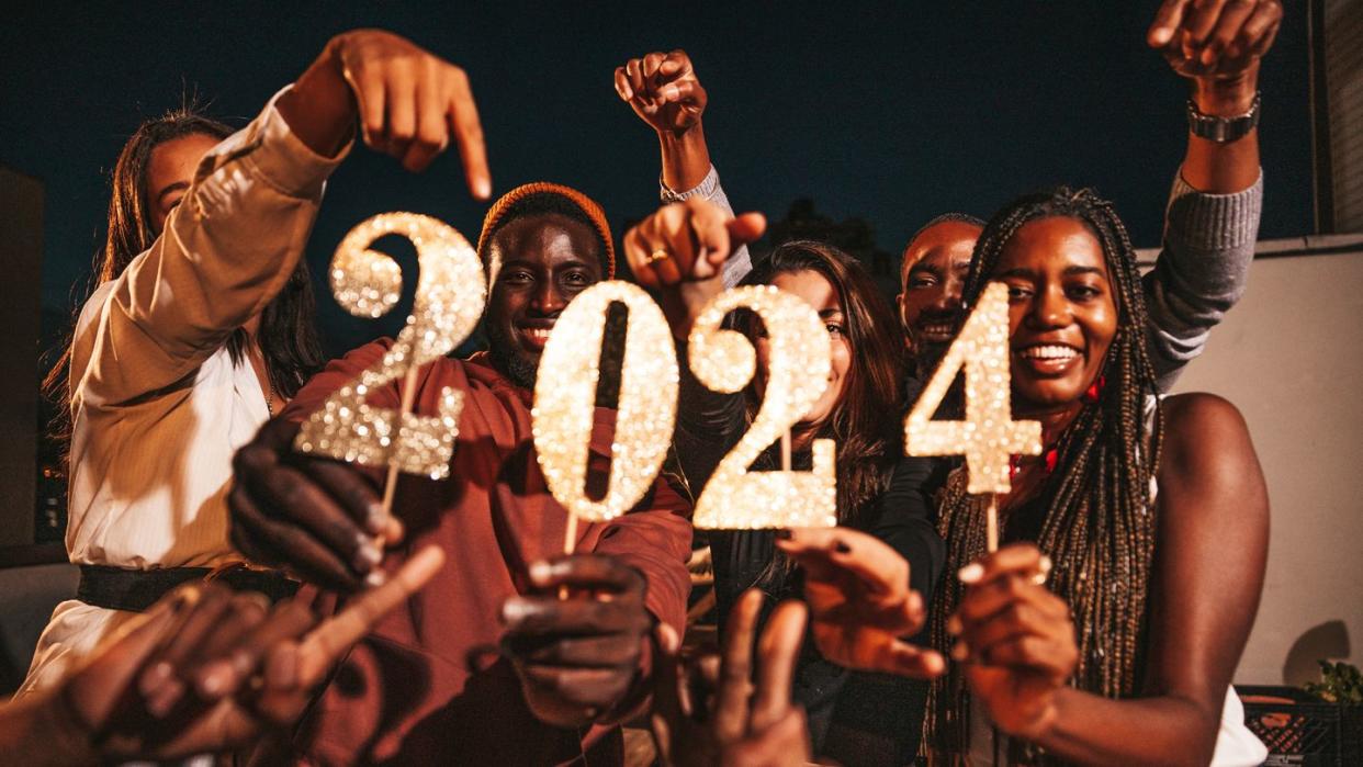 group of friends celebrating 2024 new year