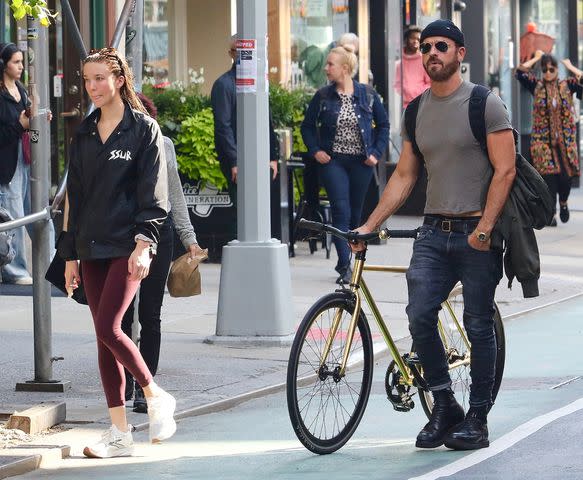 <p>BrosNYC / BACKGRID</p> Justin Theroux and Nicole Brydon Bloom in New York City on Oct. 19, 2023
