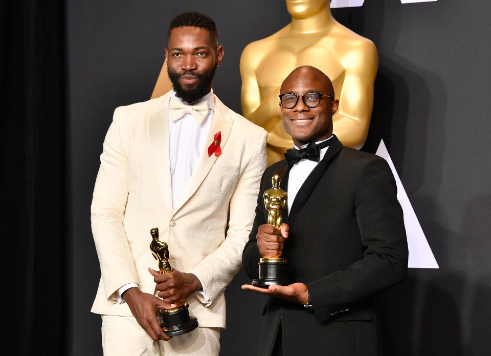 HOLLYWOOD, CA - FEBRUARY 26:  Screenwriter  Tarell Alvin McCraney (L) and writer/director Barry Jenkins, winners of Best Adapted Screenplay for 'Moonlight', pose in the press room during the 89th Annual Academy Awards at Hollywood & Highland Center on February 26, 2017 in Hollywood, California.  (Photo by Frazer Harrison/Getty Images)