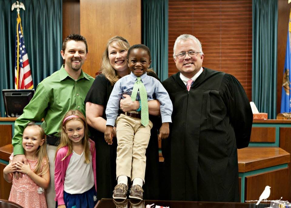 "After six months&nbsp;with him&nbsp;in the U.S., this family was all smiles that they were finally able to finalize their son's adoption." -- Mary Morrow