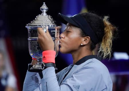 Sept 8, 2018; New York, NY, USA; Naomi Osaka of Japan kisses the U.S. Open trophy after beating Serena Williams of the USA in the women’s final on day thirteen of the 2018 U.S. Open tennis tournament at USTA Billie Jean King National Tennis Center. Robert Deutsch-USA TODAY Sports