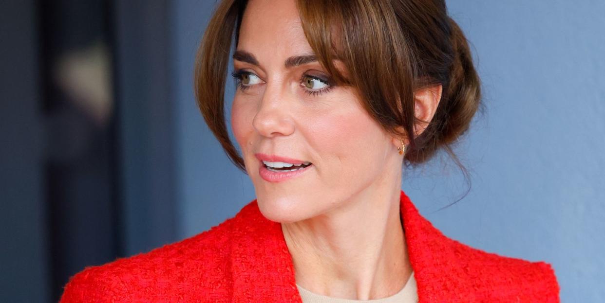 kate middleton wearing a red blazer at a royal engagement