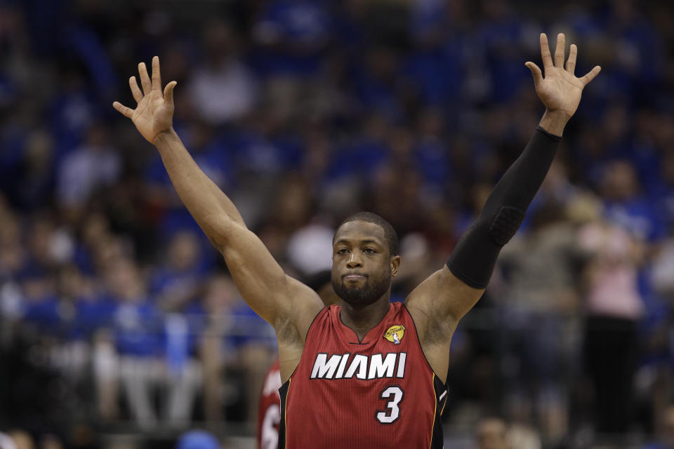 Miami Heat's Dwyane Wade reacts during the first half of Game 4 of the NBA Finals basketball game against the Dallas Mavericks Tuesday, June 7, 2011, in Dallas. (AP Photo/David J. Phillip)