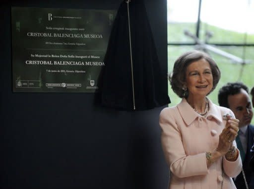 Spain's Queen Sofia unveils a placard to inaugurate the Cristobal Balenciaga Museum in the northern Spanish Basque village of Getaria. Balenciaga's home village of Getaria in Spain's northern Basque region has opened a museum that shows some 90 of his works, including the wedding dress of Belgium's Queen Fabiola and one worn by the late Princess Grace of Monaco