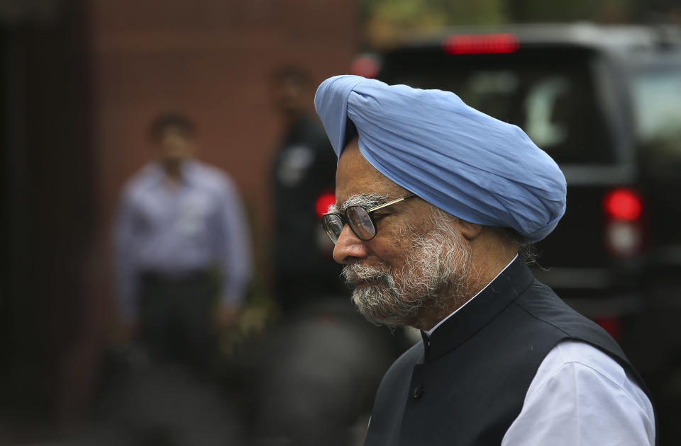 Indian Prime Minister Manmohan Singh leaves after making a statement to the media after he was shouted down by opposition politicians in the lower house of the Parliament, in New Delhi, India, Monday, Aug. 27, 2012. Singh took to Twitter on Monday to defend himself against a coal scandal roiling the country, saying accusations his government lost the country huge amounts of money were baseless. India's Parliament has been all but paralyzed since the national auditor released a report two weeks ago saying the sale of coal blocks without competitive bidding was expected to net private companies windfall profits of up to $34 billion. (AP Photo/Manish Swarup)
