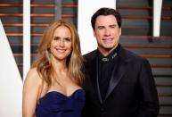 FILE PHOTO: Kelly Preston and John Travolta arrive at the 2015 Vanity Fair Oscar Party in Beverly Hills