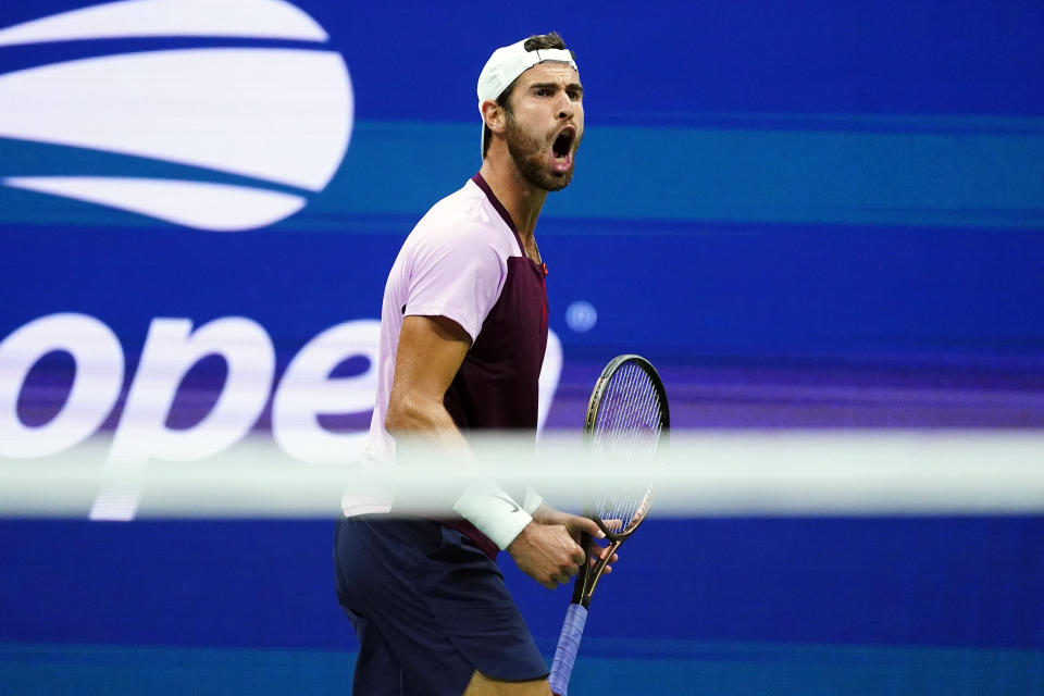 Karen Khachanov, of Russia, reacts after winning a point against Nick Kyrgios, of Australia, during the quarterfinals of the U.S. Open tennis championships, Tuesday, Sept. 6, 2022, in New York. (AP Photo/Frank Franklin II)