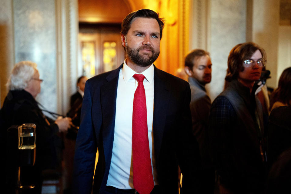 Sen.  J.D. Vance, R-Ohio, smiles as he walks out of the Senate Chamber (Andrew Harnik / Getty Images)