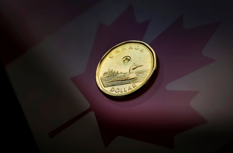 A Canadian dollar coin, is pictured in this photo illustration taken in Toronto January 23, 2015. (REUTERS/Mark Blinch/File Photo)