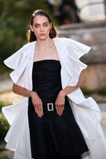 Convent chic: One of several looks inspired by nun's habits in Chanel's haute couture Paris show