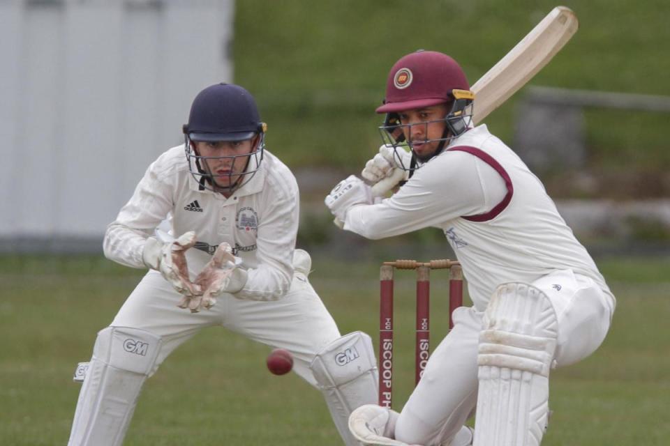 Tonge overseas amateur, Justin Gilliland, batting watched by Blackrod wicketkeeper, Jacob Stevenson. Picture by Harry McGuire