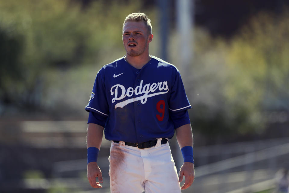 FILE - In this Feb. 26, 2020, file photo, Los Angeles Dodgers second baseman Gavin Lux is shown during a spring training baseball game against the Los Angeles Angels, in Glendale, Ariz. The loaded Dodgers have a couple of promising rookies who could help the club this year, led by the sweet-swinging Lux. (AP Photo/Gregory Bull, File)