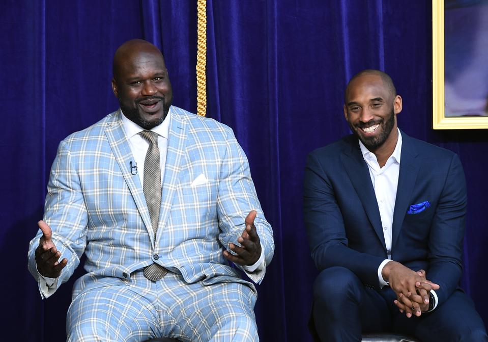 Shaquille O’Neal reacts to his former players seated in the audience with Kobe Bryant looking on during unveiling of his statue at Staples Center March 24, 2017, in Los Angeles. (Photo by Kevork Djansezian/Getty Images)