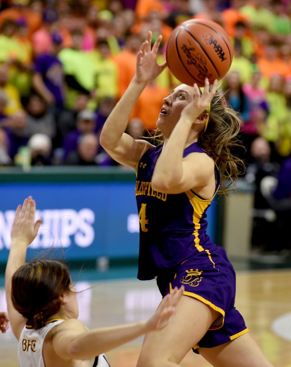 Blissfield's Avery Collins drives to the basket during Thursday's Division 3 regional semifinal against Madison Heights Bishop Foley.