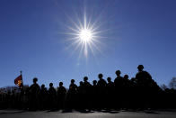 Members of the Japan Self-Defense Forces stand as they listen to Japan's Prime Minister Fumio Kishida during a review at the Japan Ground Self-Defense Force Camp Asaka in Tokyo, Japan, Saturday, Nov. 27, 2021. (Kiyoshi Ota/Pool Photo via AP)