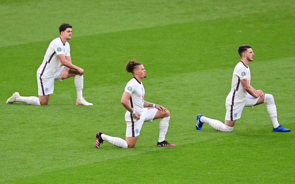 England to resume taking a knee in World Cup opener - AFP via Getty Images/Neil Hall