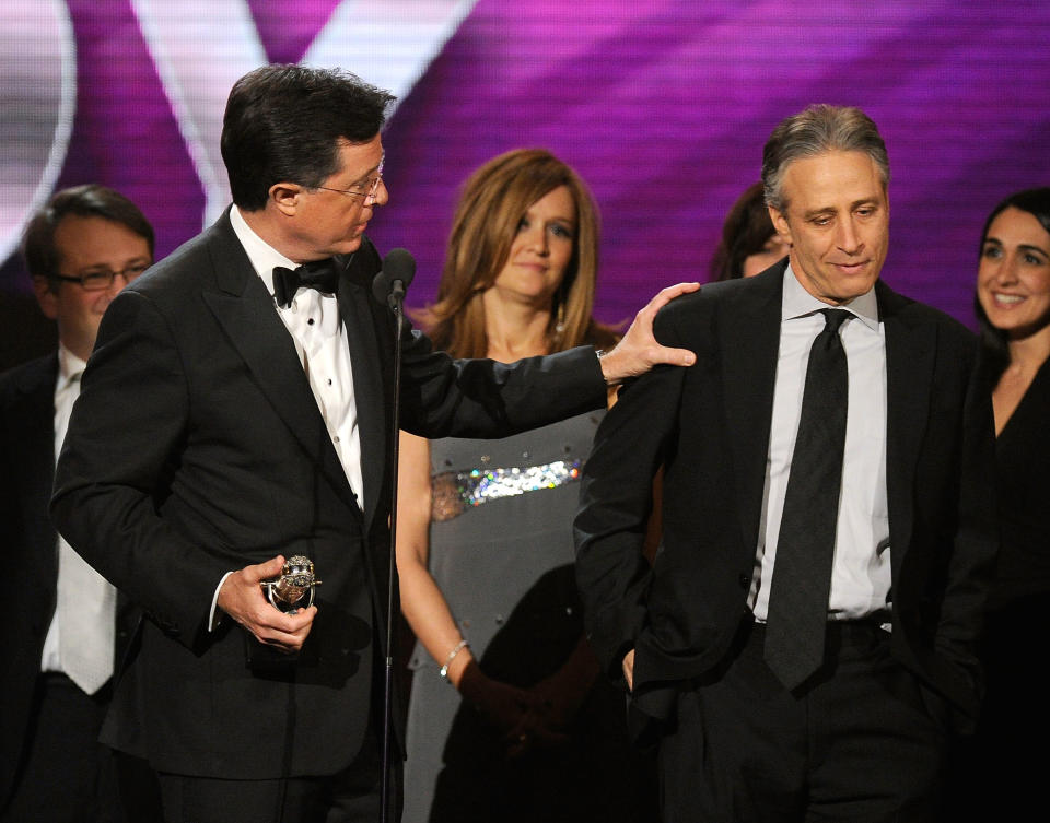 NEW YORK, NY - MARCH 26:  Stephen Colbert (L) and Jon Stewart speak onstage at the First Annual Comedy Awards at Hammerstein Ballroom on March 26, 2011 in New York City.  (Photo by Dimitrios Kambouris/Getty Images)