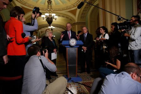 Senate Minority Leader Chuck Schumer, accompanied by Sen. Patty Murray (D-WA) and Sen. Dick Durbin (D-IL), speaks to the media about plans to repeal and replace Obamacare on Capitol Hill in Washington, U.S., June 27, 2017. REUTERS/Aaron P. Bernstein