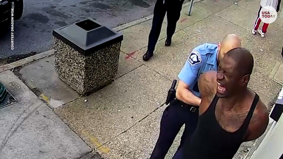 Surveillance video from the early moments of George Floyd's fatal Minneapolis police encounter in May 2020.