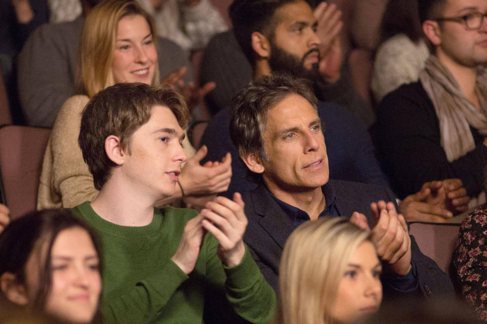 Austin Abrams and Ben Stiller clap in theater seats