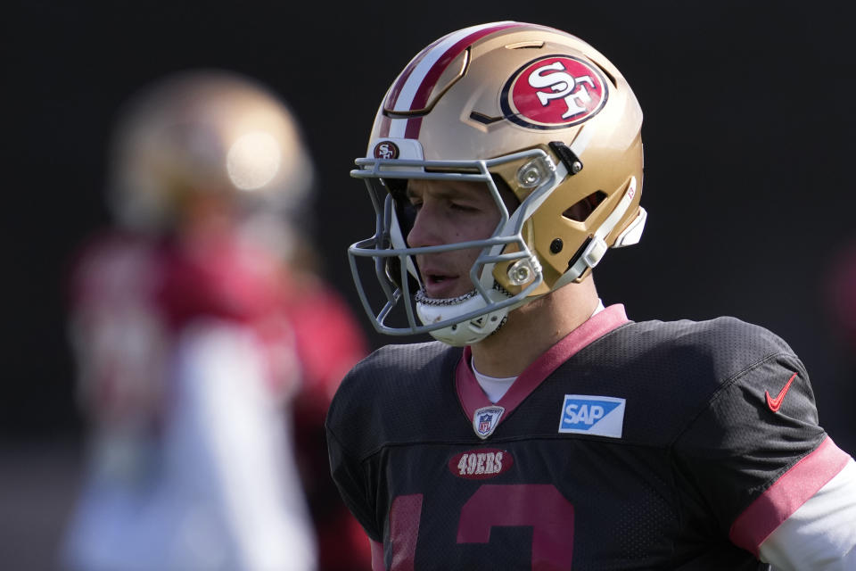 San Francisco 49ers quarterback Brock Purdy (13) warms up during a practice ahead of the Super Bowl 58 NFL football game Thursday, Feb. 8, 2024, in Las Vegas. (AP Photo/John Locher)