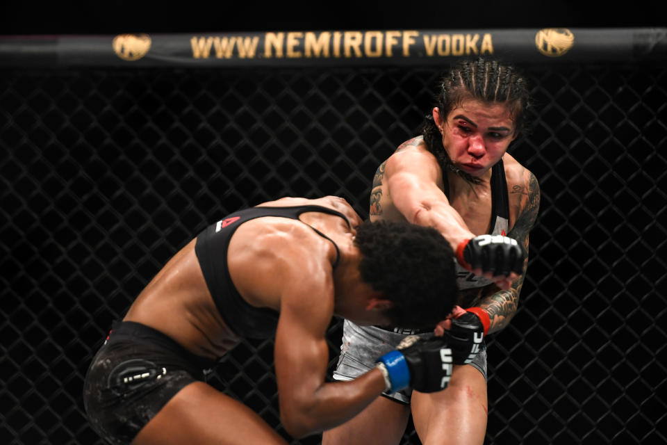 JACKSONVILLE, FL - MAY 16: Claudia Gadelha (R) of Brazil fights Angela Hill (L) of the United States in their Women's Strawweight bout during UFC Fight Night at VyStar Veterans Memorial Arena on May 16, 2020 in Jacksonville, Florida. (Photo by Douglas P. DeFelice/Getty Images)