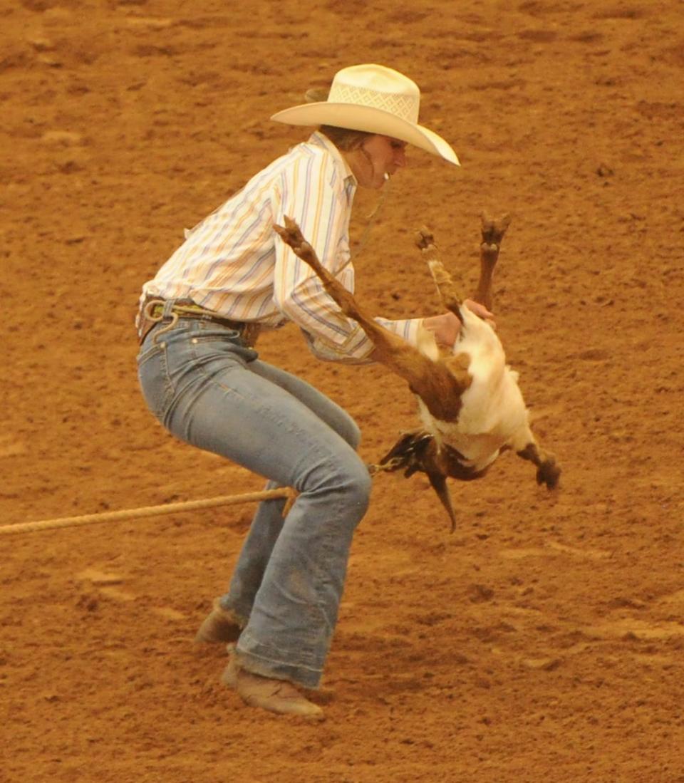 Uvalde's Maddie Aasbo competes in goat tying.