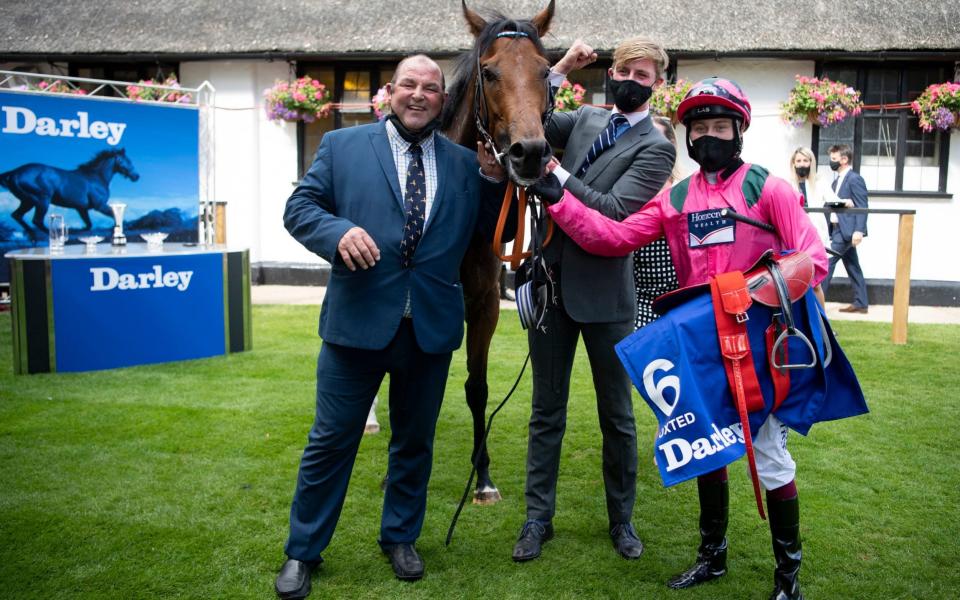 Trainer Roger Teal (left) and Oxted and Cieren Fallon (right) after winning The Darley July Cup Stakes - PA